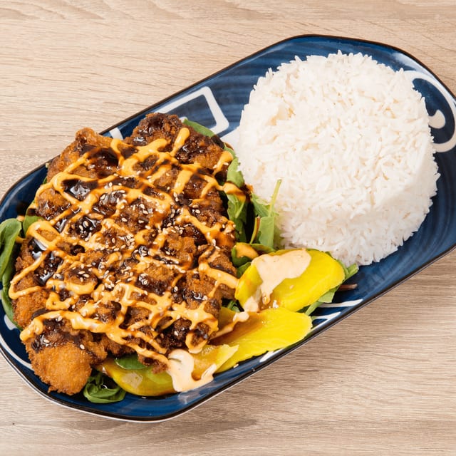 L. Fried Pork Chop Over Rice.